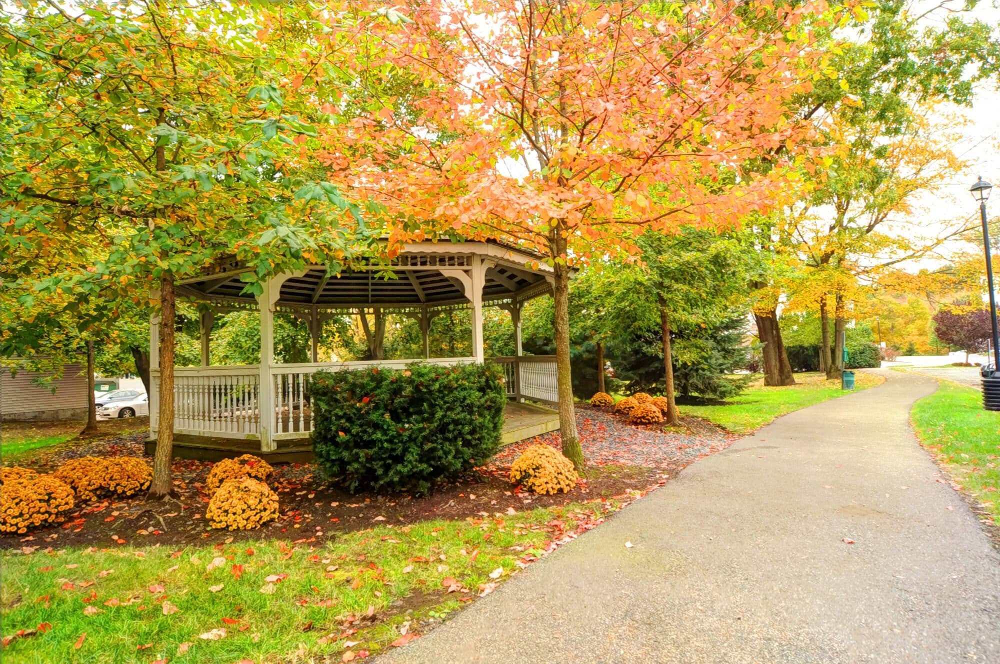 The community gazebo on the wooded grounds at Chestnut Park Apartments